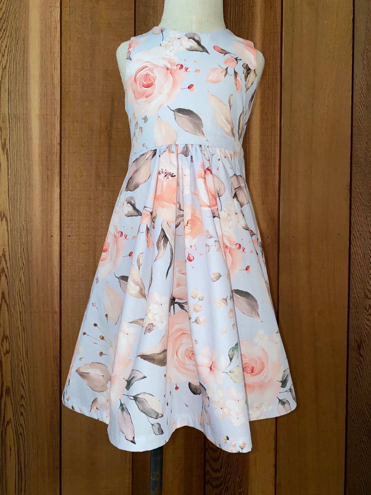 Large pink roses on baby blue dress size 2