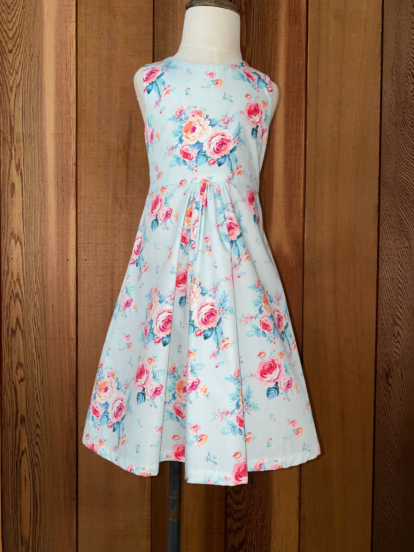 Roses on mint dress size 4